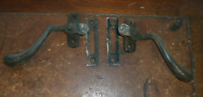 Two Antique cast iron window latches, with keep plates
