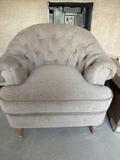 Next mink armchair cost £425