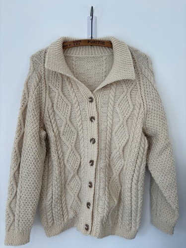 Hand knitted aran - hand,