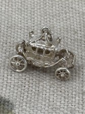 VINTAGE silver coronation carriage charm moving back wheels