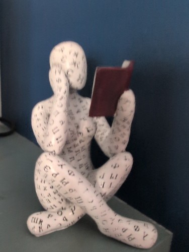 Reading sitting female figure - reading,