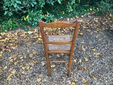 Pretty small occasional / bedroom chair with wicker seat. 