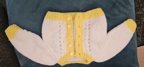 Hand knitted baby - hand,