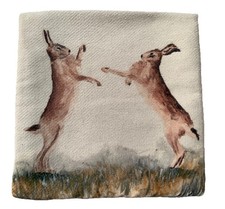 Boxing Hares cushion cover by