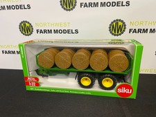 SIKU 2891 1:32 SCALE TRAILER WITH ROUND BALES