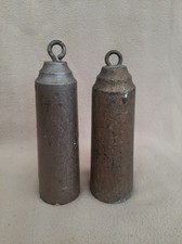 PAIR OF ANTIQUE BLACK FOREST CLOCK WEIGHTS