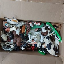 large bundle of plastic farm animal toys all shapes and sizes