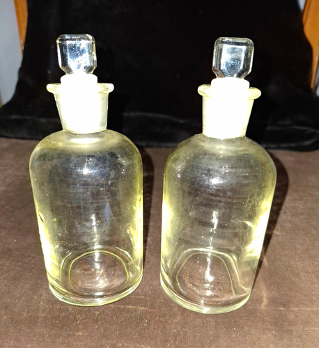 Pair vintage glass medicine - of,