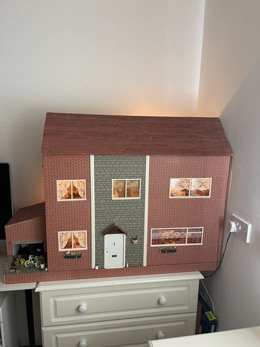 Dolls house complete with - dolls,