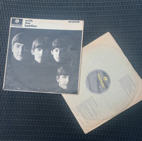 With the beatles vinyl album - the,