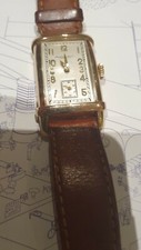 14k gold retangular IWC 1940s watch Top hat style.