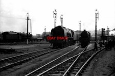 PHOTO  A BUSY SHED YARD ON A HOT SUMMER'S DAY AND AS YOU CAN SEE THERE IS A SHED