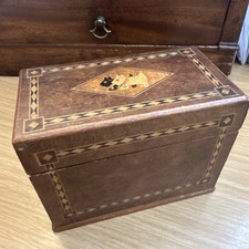 An antique burr walnut playing