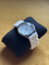 T&J watch with a white chain