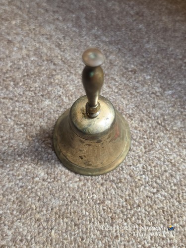 Vintage hand bell - hand,