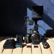 Canon EOS C300 MK1 with screen, CF cards, chargers and battery.