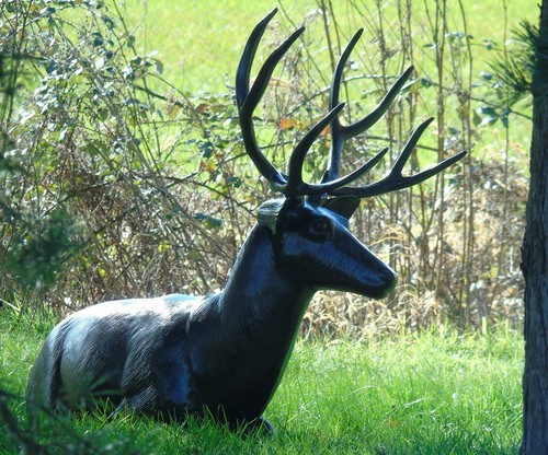 Deer garden ornament laying - garden,