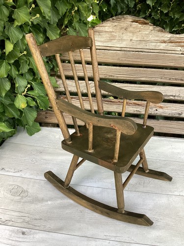 One wooden rocking chair - one,