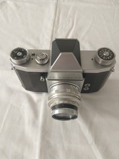 Praktica IV F.  Used condition but some  viewfinder mirror damage. 2 Case cracks