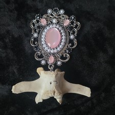 A Victorian Brooch With Pink