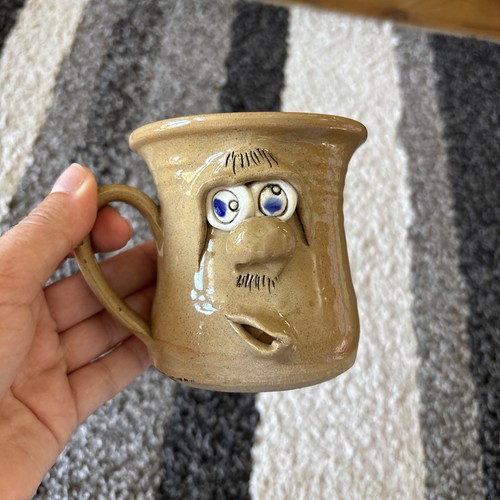 Pretty ugly pottery mug made - pretty,