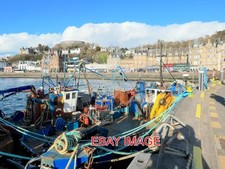 PHOTO  THESE TWO FISHING VESSELS WERE IN THE SMALL NUMBER GATHERED IN OBAN HARBO