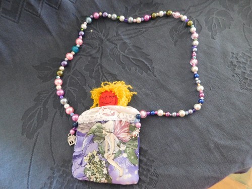 Voodoo doll necklace pouch - doll,