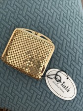 Suzy Smith International Gold