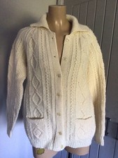 Hand knitted aran - hand,