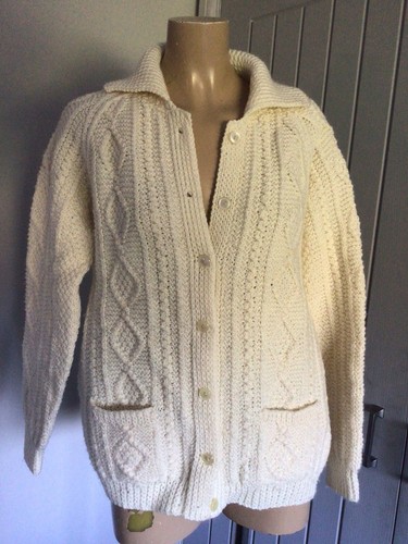 Hand knitted aran - hand, cable