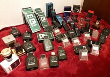 Job lot of 26 empty quality aftershave bottles and original boxes. 