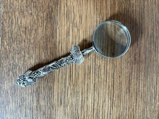 Silver Magnifying Glass From