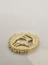 Antique Carved Antler Jumping