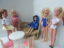 Sewing pattern for Vintage Sindy Barbie swimsuits hoodie shorts skirt top outfit