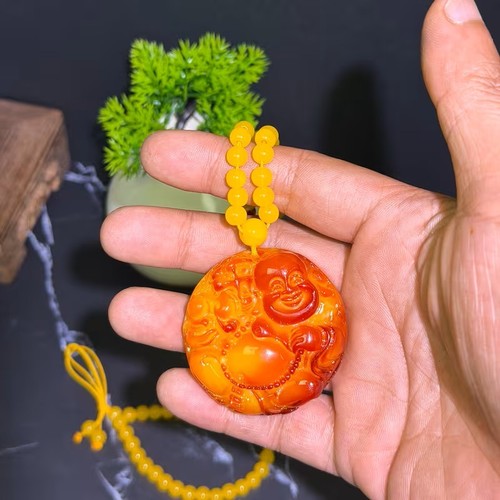 Round amber buddha beautifully