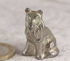 Rough Collie sitting white metal heavy ornament just over 1 inch tall sheltie