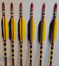 A set of six handmade wooden