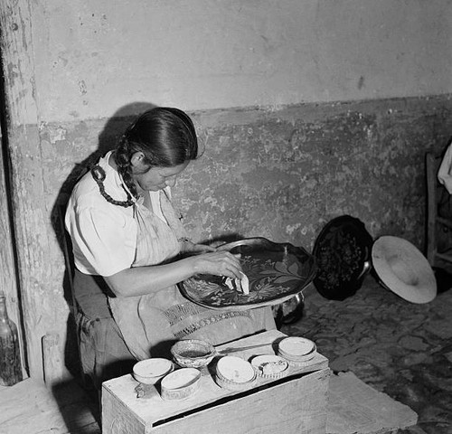 Local women paints pottery - , in