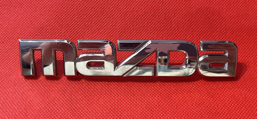 Mazda car badge emblem - car,