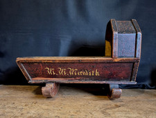 A wonderful 19th century Welsh folk art painted pine doll's cradle. Circa 1840.
