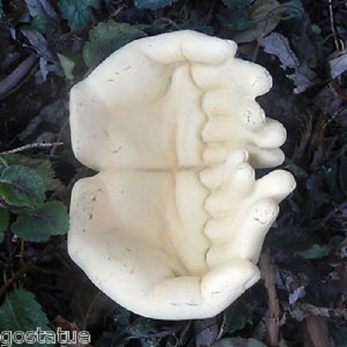 Latex hand mold bird feeder