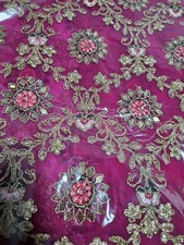 unstitched pink suit with