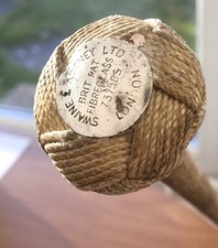 A VINTAGE PLAITED FIBREGLASS RIDING CROP BY SWAINE & ADENEY, LONDON HORSES