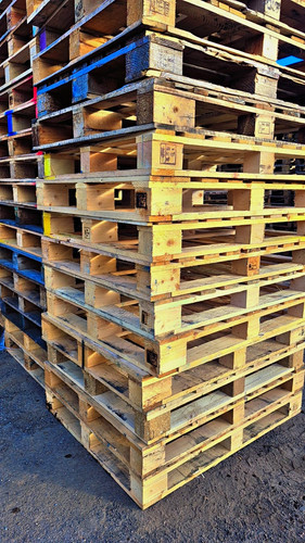 Wooden warehouse pallets stack - pallets,