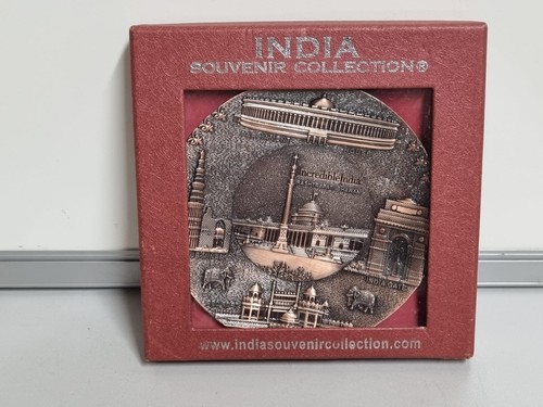 Embossed metallic souvenir