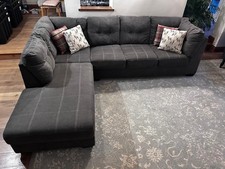 Dark grey big corner sofa with