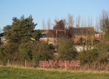 PHOTO  SOLAR PANELS REEDHAM SOLAR THERMAL PANELS ON THE LEFT FOR PROVIDING HOT W