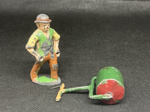 Gardener with lawn - lawn, roller