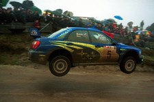 WRC Rally of Portugal 2001 Richard Burns flies over the Fafe jump - Old Photo