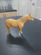A Beswick Palomino Horse With Braided Mane